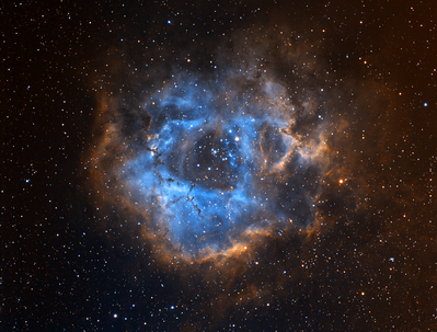 The Rosette Nebula Narrowband
My first shot of the Rosette Nebula with my new set of Baader narrowband filters. 

The image was combined using SII (ionized sulphur) for the red channel, Ha (hydrogen alpha) for the green channel and OIII (ionized oxygen) for the blue channel. This combination is known as the "Hubble Palette" and is the same method used by NASA for the famous Pillars of Creation image.

The exposure breakdown is:

Ha   25 x 10 min
OIII  34 X 10 min
SII    33 x 10 min

For a total exposure time of about 15 hours.

AstroTech AT65EDQ telescope, Losmandy G11 mount, SBIG ST-8300M camera + FW5 filter wheel, Baader Narrowband filter set.
