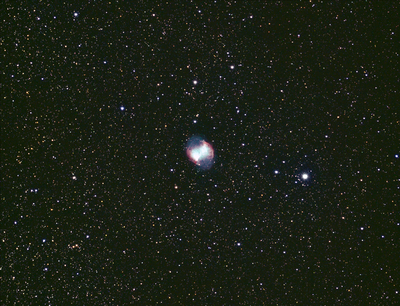 M27 Dumbbell Nebula
Twain Harte, California.

Unmodified Sony a7R and Astro-Tech AT65EDQ 65mm f/6.5 refractor mounted on a Losmandy G11 mount. 11 x 5 minute sub-frames, 5 averaged darks processed with DeepSkyStacker.
