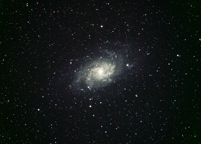 M33 Triangulum Galaxy
Twain Harte, California.

Unmodified Sony a7R and Astro-Tech AT65EDQ 65mm f/6.5 refractor mounted on a Losmandy G11 mount. 20 x 10 minute sub-frames, 5 averaged darks processed with DeepSkyStacker.
