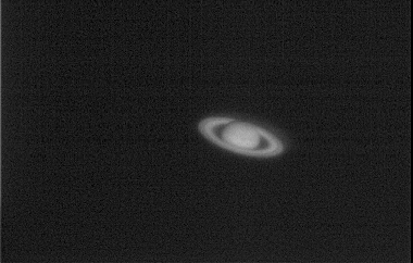 Saturn
At 4am however my poor bloodshot eyes popped wide open when this single barlowed shot of Saturn came up on my screen. Wow what this camera can do when seeing allows! (BTW I keep having this Star Trek fantasy where I steal a force field from the Enterpise and hook it up to the front of my 8" OTA making a column straight out of the atmosphere therefore making a vacuum for excelent seeing and then... Err?!? Jeeze, I have got to stop getting to bed at 6am! ;o) )
Keywords: Saturn