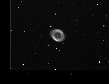 M57 Ring Nebula in Lyra
After about 2 years of dry spell, my first image with the new setup! This is a stack of 45 images of 20 second integration time each with the MX7 mono chip in 2x2 black and white binned mode taken with AstroArt. The images were processed with IRIS and AstroArt - a light unsharp mask was applied to each source frame, stacked then DDP applied in AA.

The GM8 setup performed flawlessly. There was no guiding or PEC for this image (that explains the 20 second integrations) and polar alignment was done with the polar alignment scope only. The next time I'm out I want to grab some color data with the AK chip!
Keywords: M57 Ring Nebula Lyra