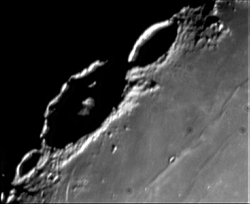 Moon
A 5 second AVI of a nice high contrast area. The detail this camera is capible of is stunning. I have a great time comparing this image with the very first image I took with the old VC. The stacking did produce some artifacts though that show a dire need for my comprehention of flat fields! ;o)
Keywords: Moon